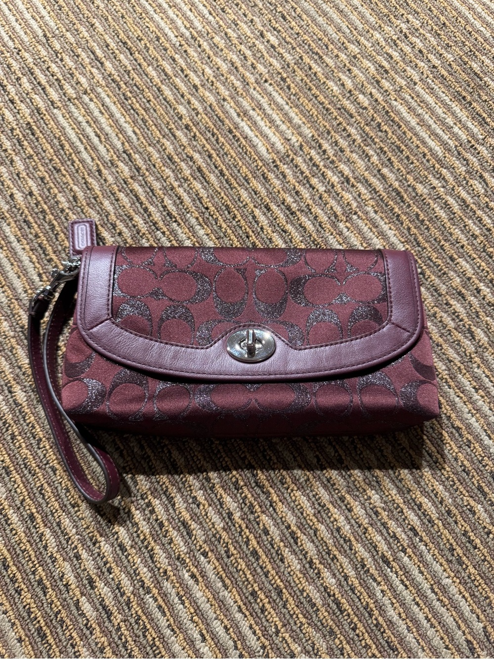 Coach Plum Signature Turn-Lock Wristlet